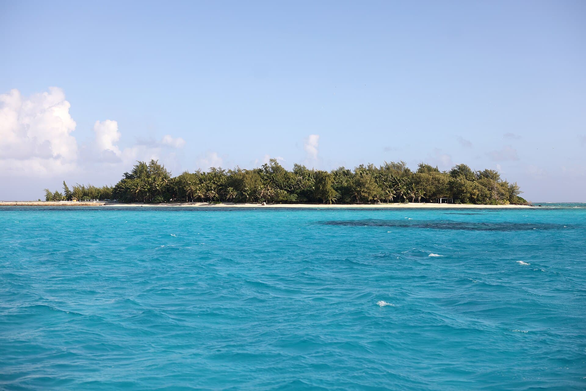 Turquoise lagoon and white sand beach in the Mariana Islands